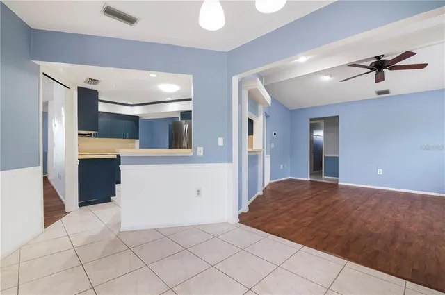a view of a kitchen with a sink and an oven