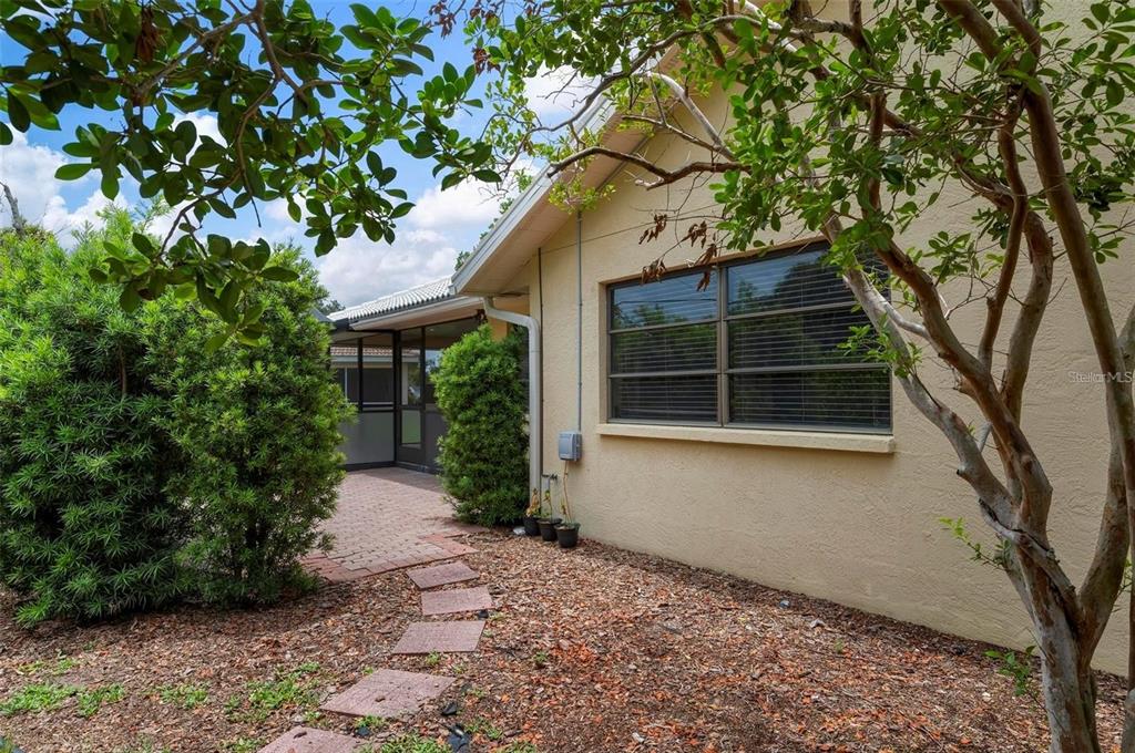 133 1st Avenue Nokomis, FL 34275 - Photo 30 of 32 a house with a tree in front of it