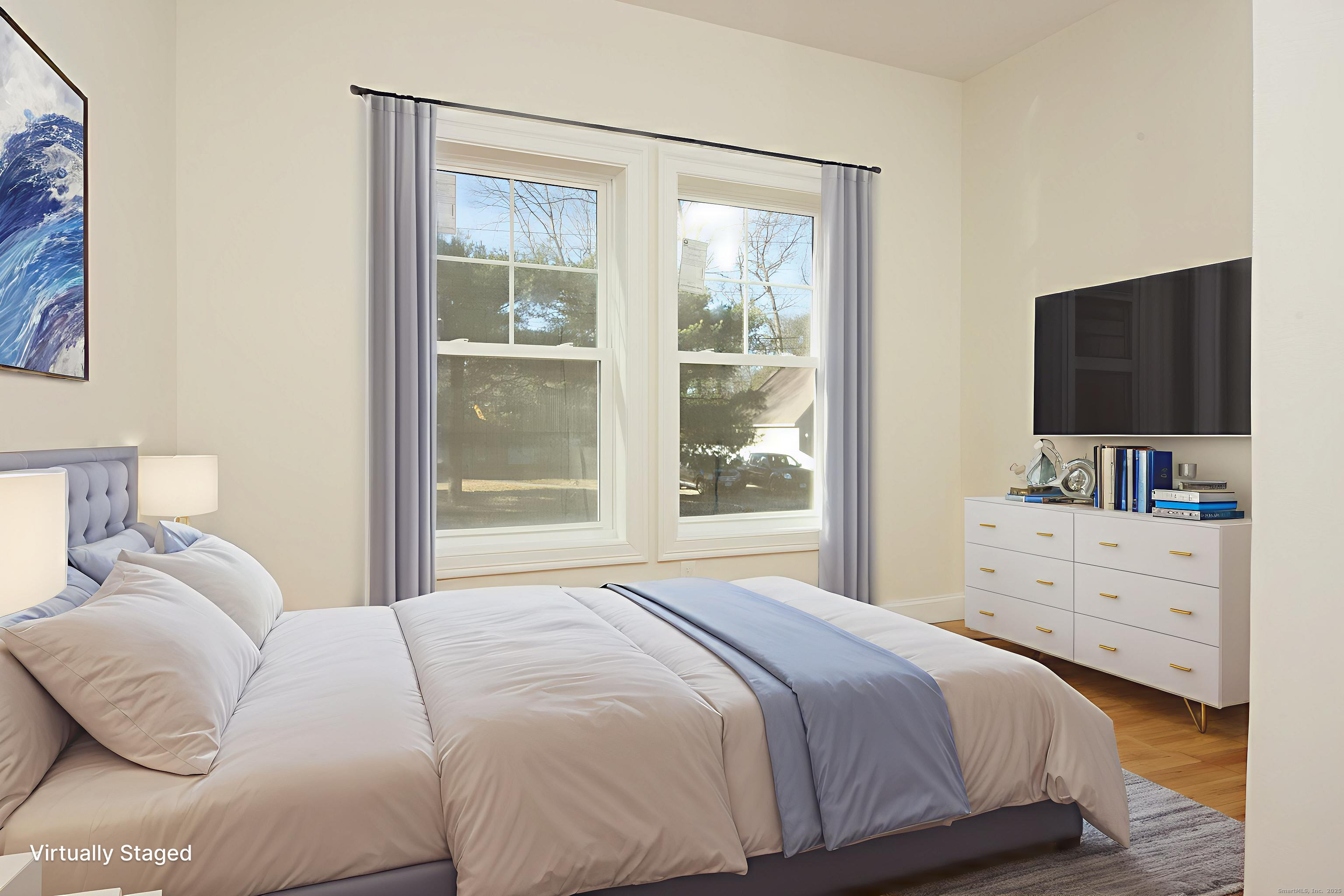 151 Benz Street Ansonia, CT 06401 - Photo 19 of 29 a bedroom with a large bed and a flat tv screen on dresser