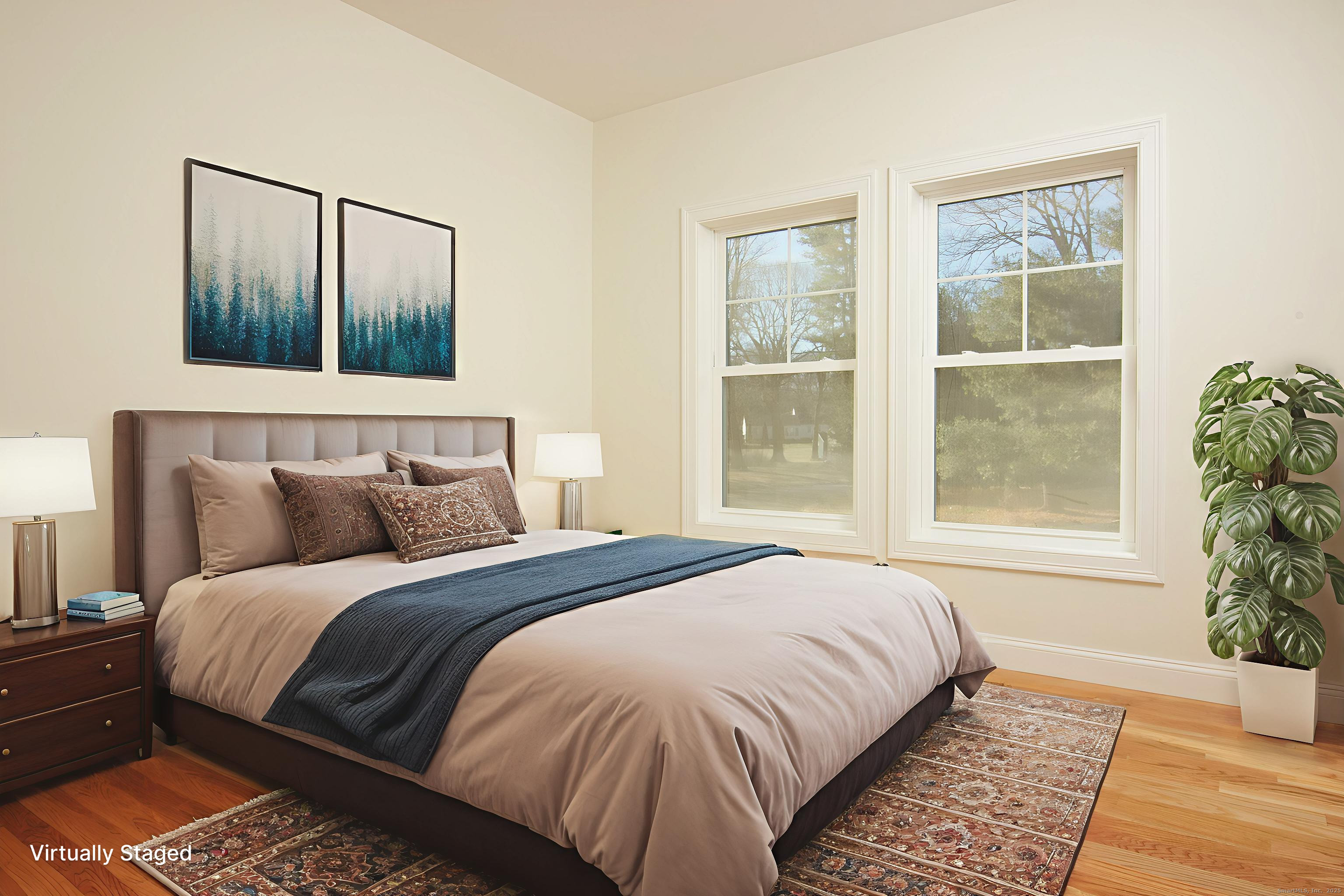 151 Benz Street Ansonia, CT 06401 - Photo 22 of 29 a bedroom with a large bed and a window