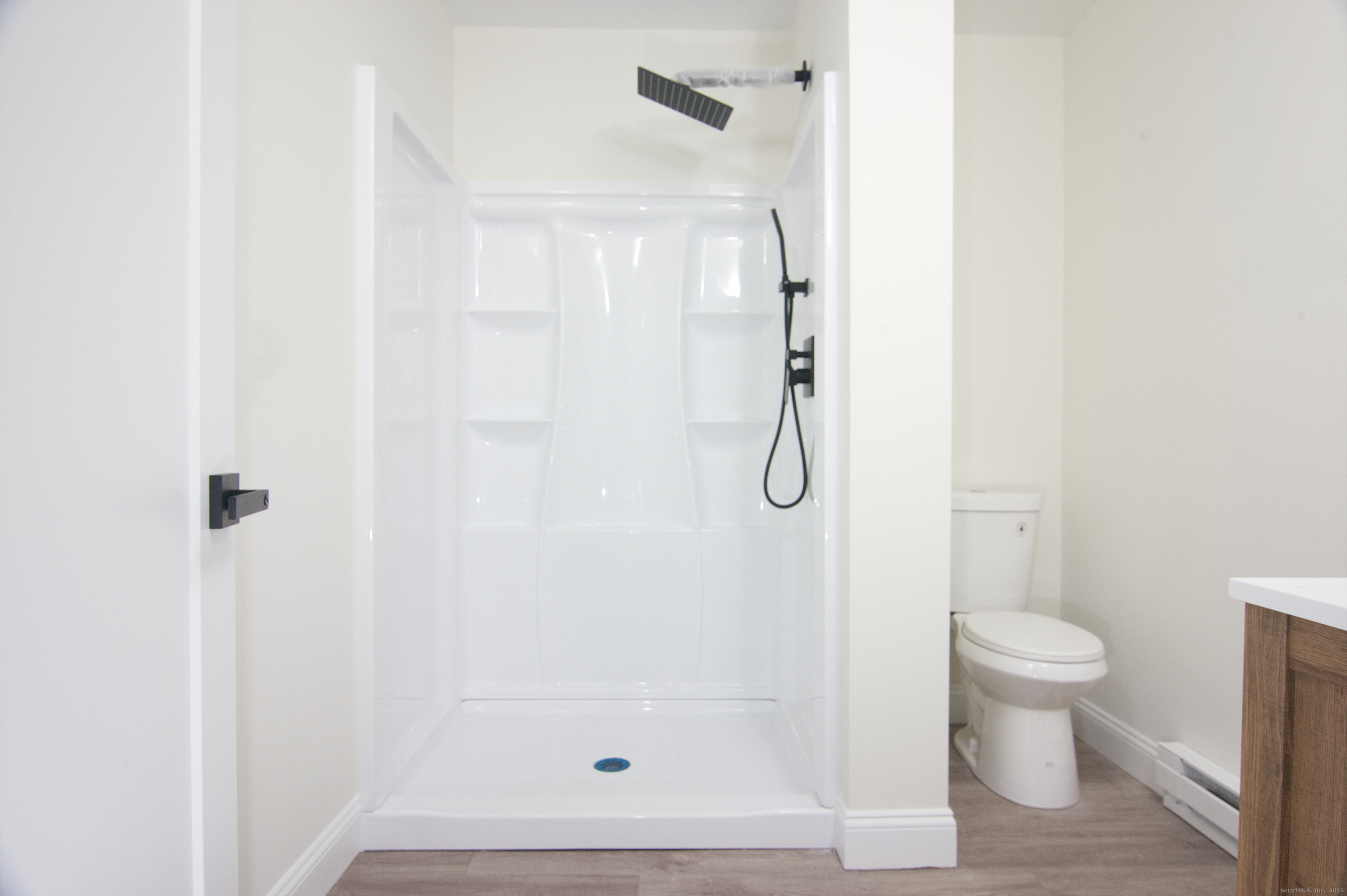151 Benz Street Ansonia, CT 06401 - Photo 29 of 29 a bathroom with a shower and a toilet