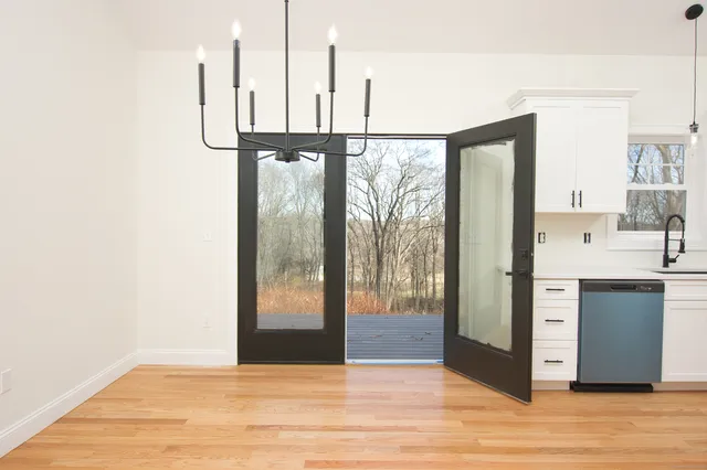 a view of a kitchen from the hallway