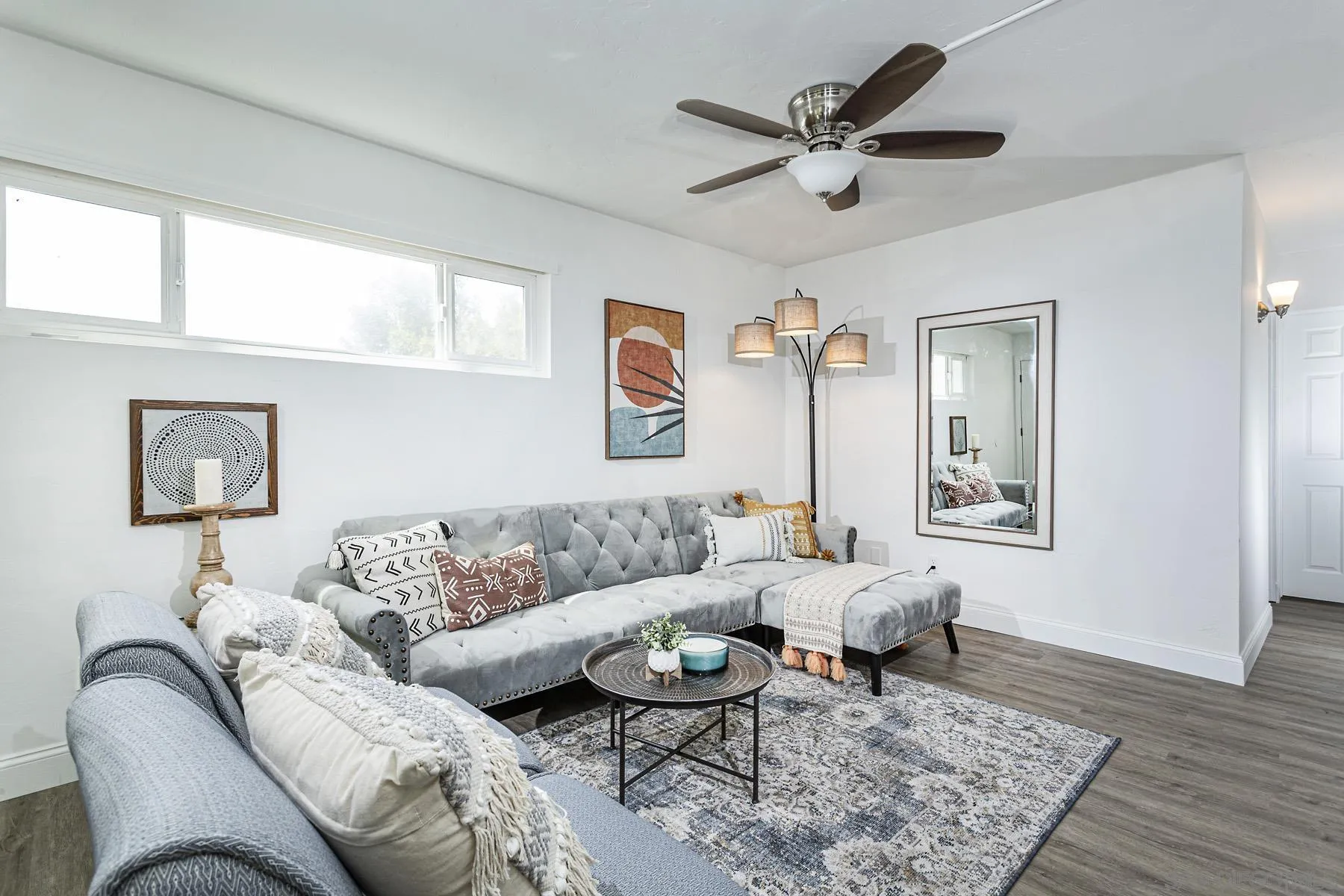 802 Vanderbilt Place San Diego, CA 92103 - Photo 5 of 14 a living room with furniture a rug and a window