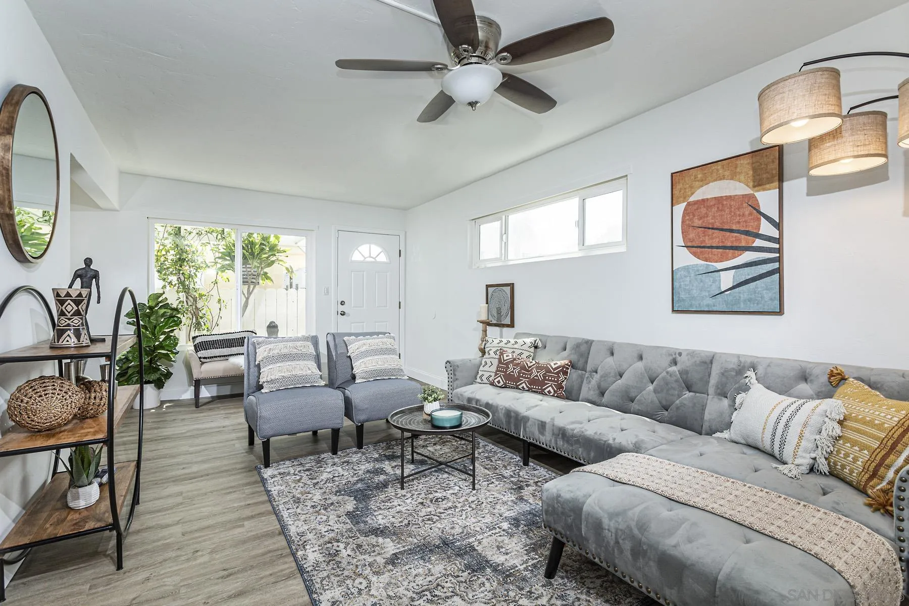 802 Vanderbilt Place San Diego, CA 92103 - Photo 6 of 14 a living room with furniture and a large window