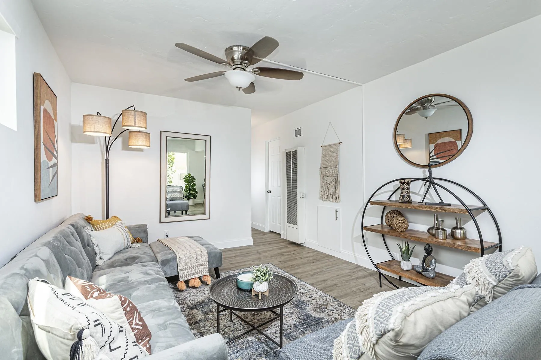 802 Vanderbilt Place San Diego, CA 92103 - Photo 7 of 14 a living room with furniture a window and wooden floor
