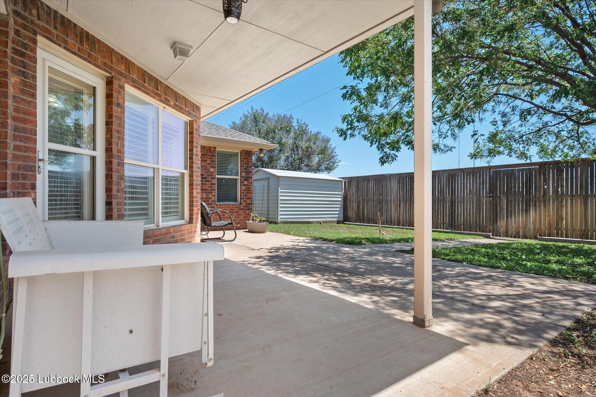 10401 Elgin Avenue Lubbock, TX 79423 - Photo 26 of 27 a house view with a backyard space
