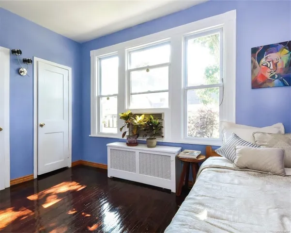 a living room with furniture and window