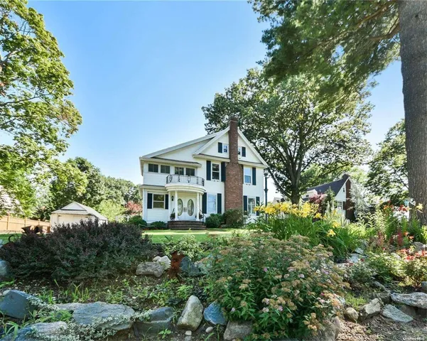 a house view with a garden space