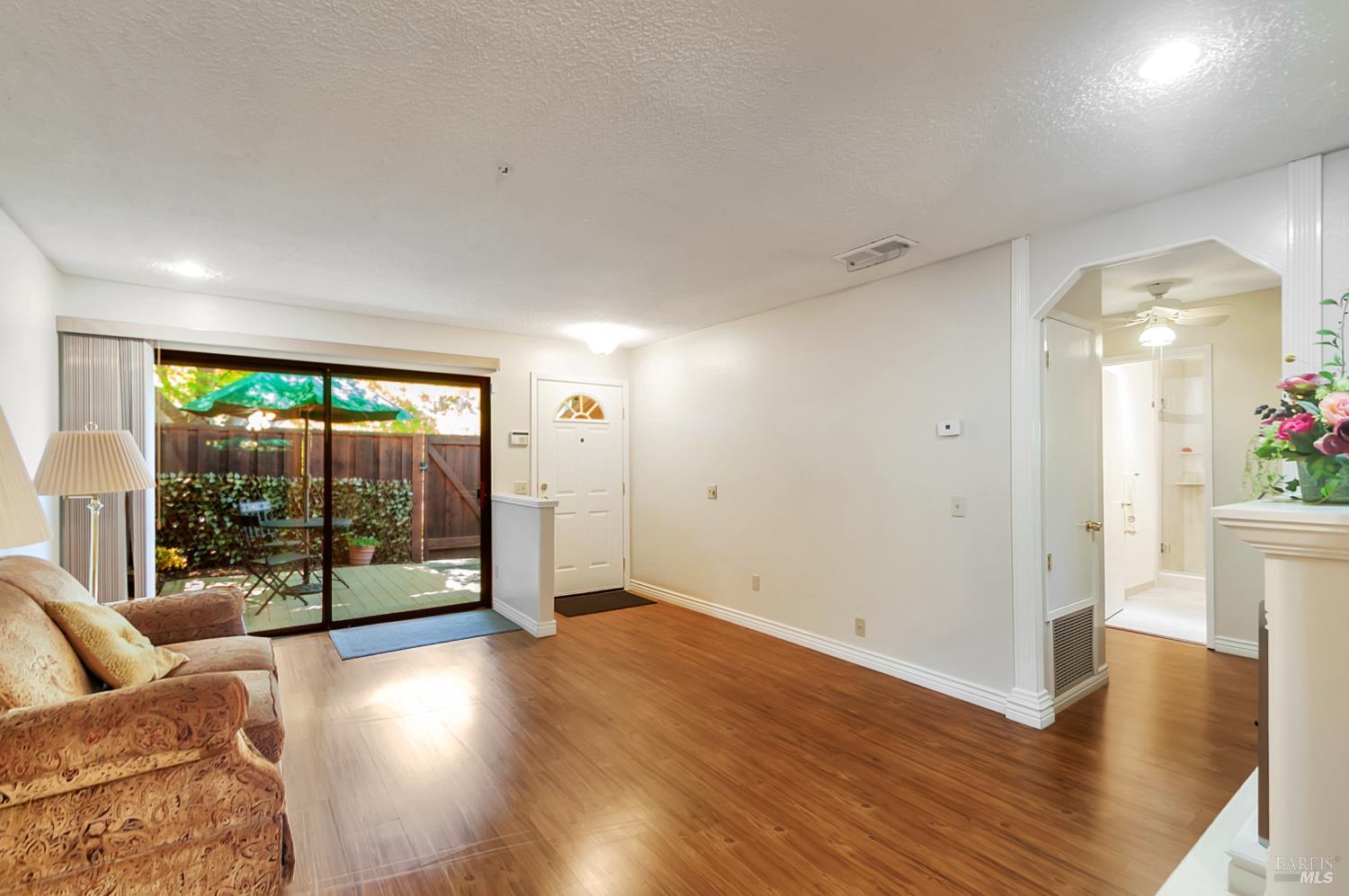 6162 Country Club Drive Rohnert Park, CA 94928 - Photo 7 of 19 a view of a livingroom with wooden floor and furniture