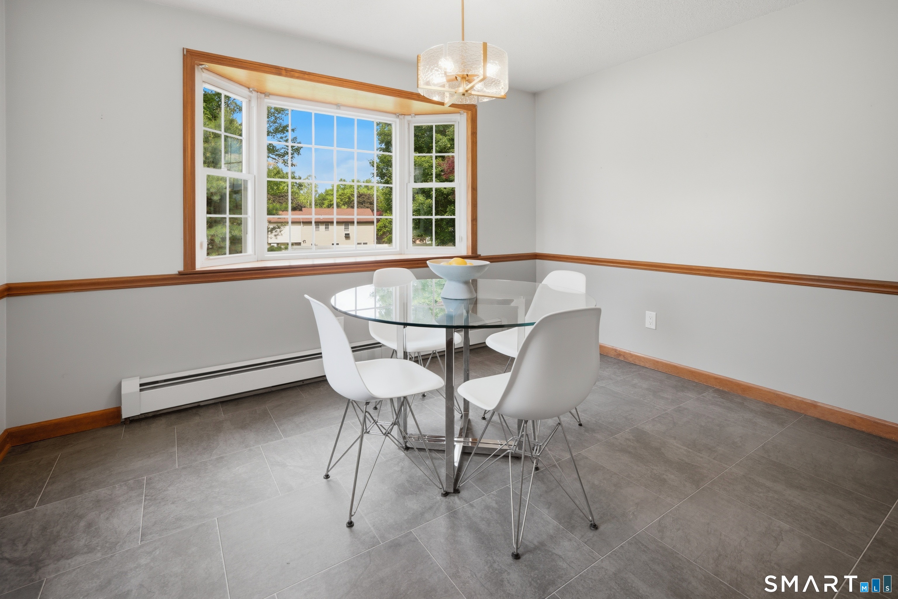 211 Valley View Road Manchester, CT 06040 - Photo 13 of 39 a dining room with furniture and window