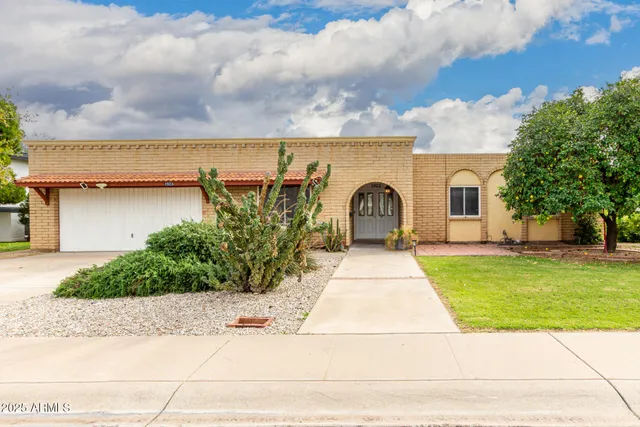 front view of house with a yard