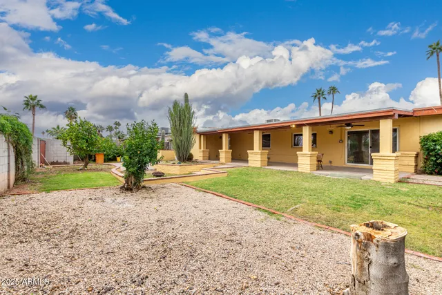 front view of a house with a yard