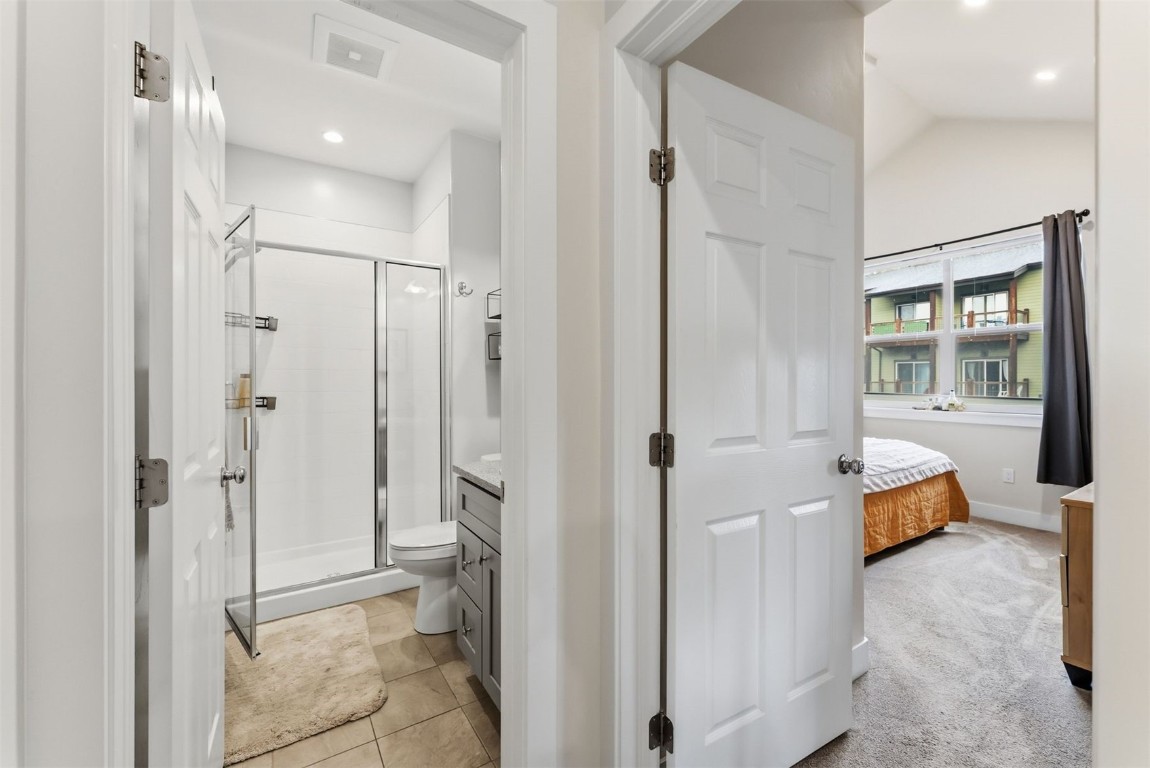 119 Wayback Drive, Unit 119 Keystone, CO 80435 - Photo 14 of 29 a bathroom with a tub and a shower