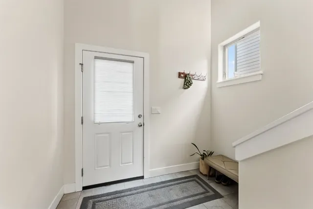 a view of hallway with washer and dryer
