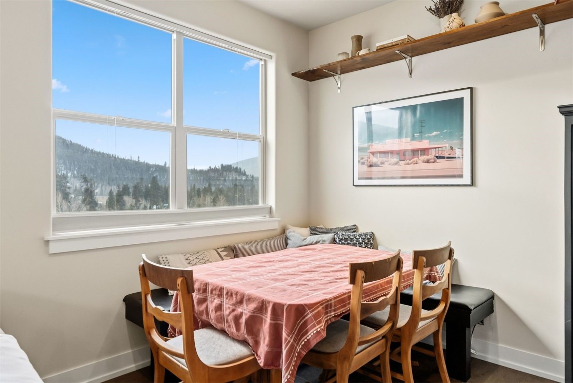 119 Wayback Drive, Unit 119 Keystone, CO 80435 - Photo 8 of 29 a dining room with furniture and window
