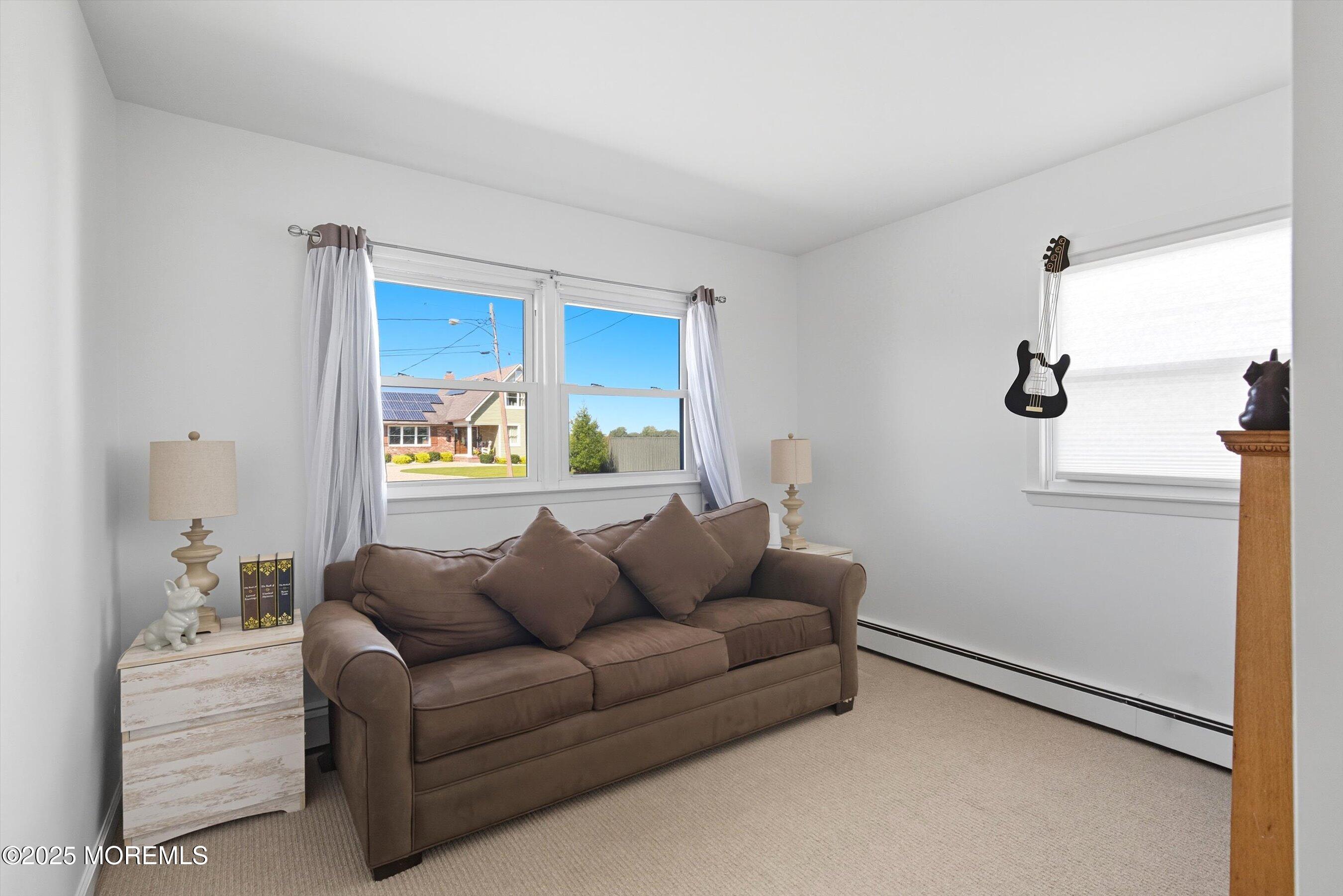 173 Cliff Road Brick, NJ 08724 - Photo 11 of 37 a living room with furniture and a window