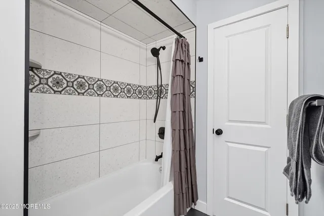 a bathroom with a bathtub