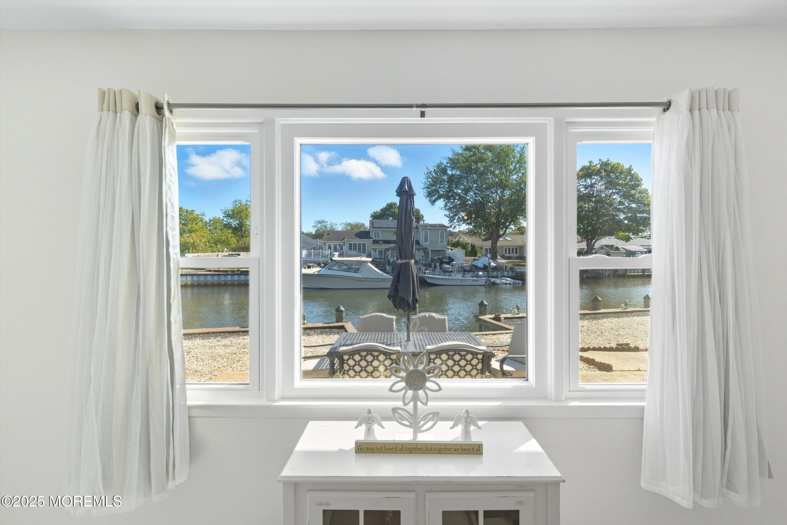 173 Cliff Road Brick, NJ 08724 - Photo 16 of 37 a room with a large window and a bed