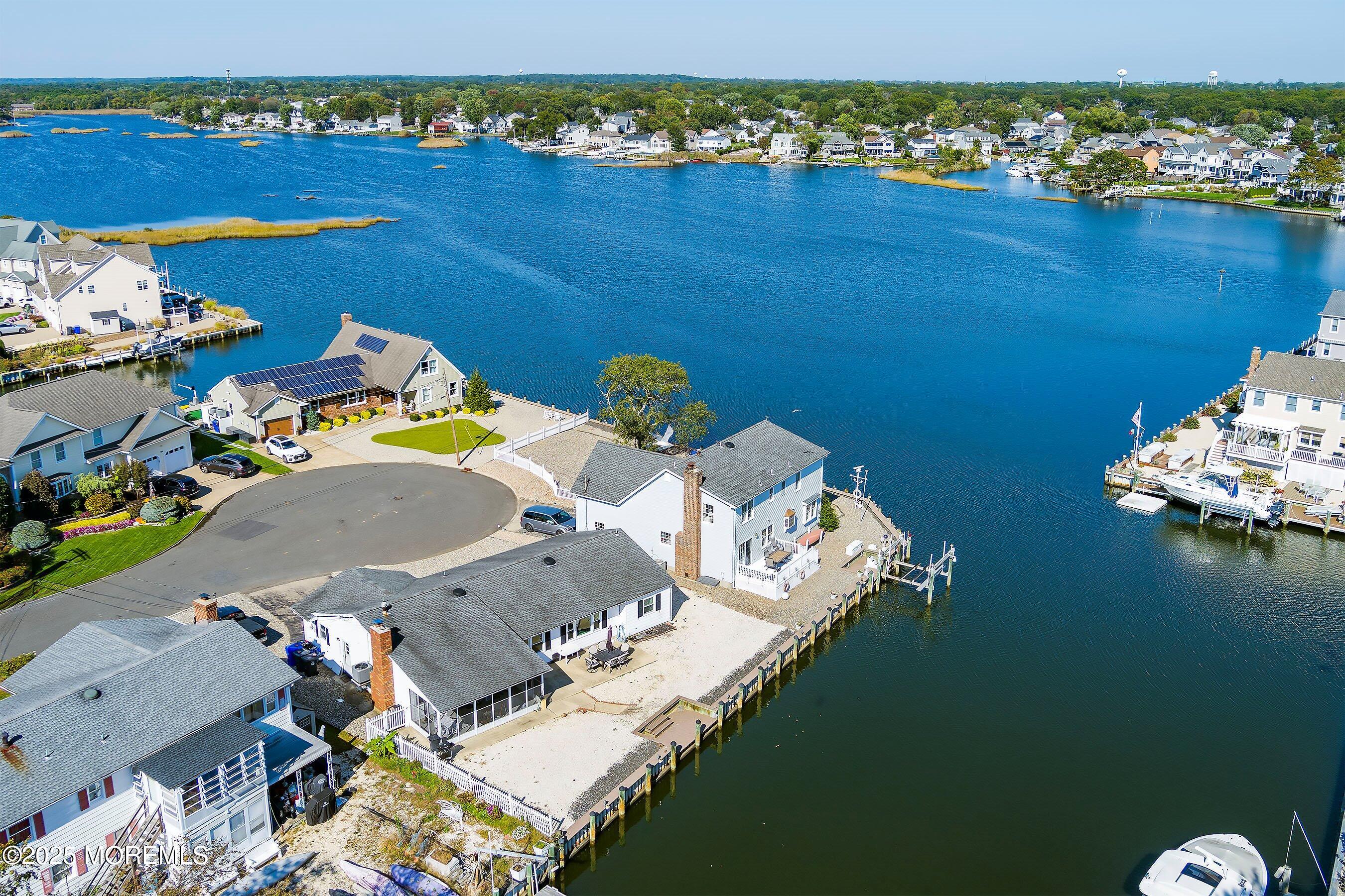 173 Cliff Road Brick, NJ 08724 - Photo 22 of 37 an aerial view of a house with a lake view
