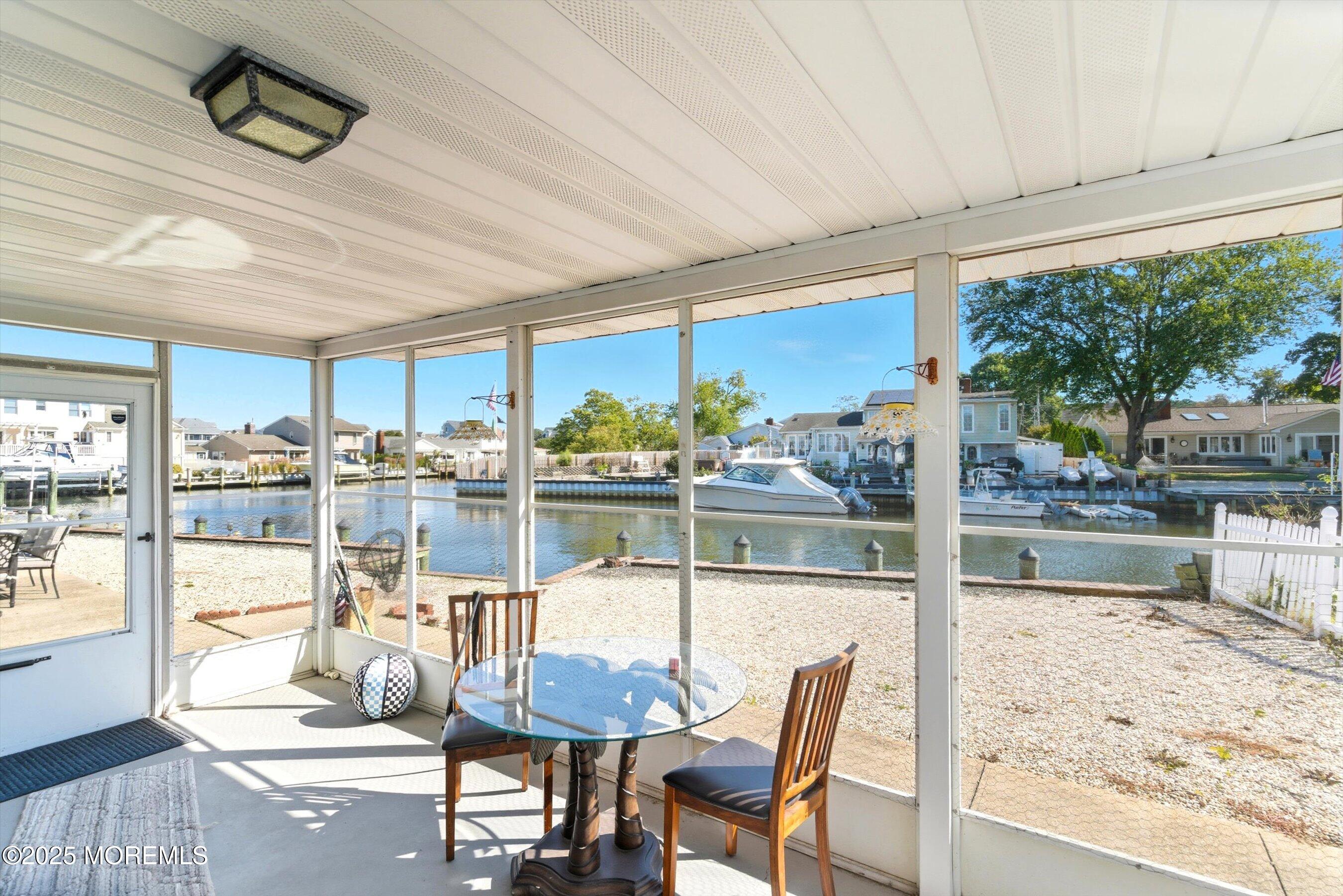 173 Cliff Road Brick, NJ 08724 - Photo 23 of 37 a dining room with furniture and floor to ceiling window