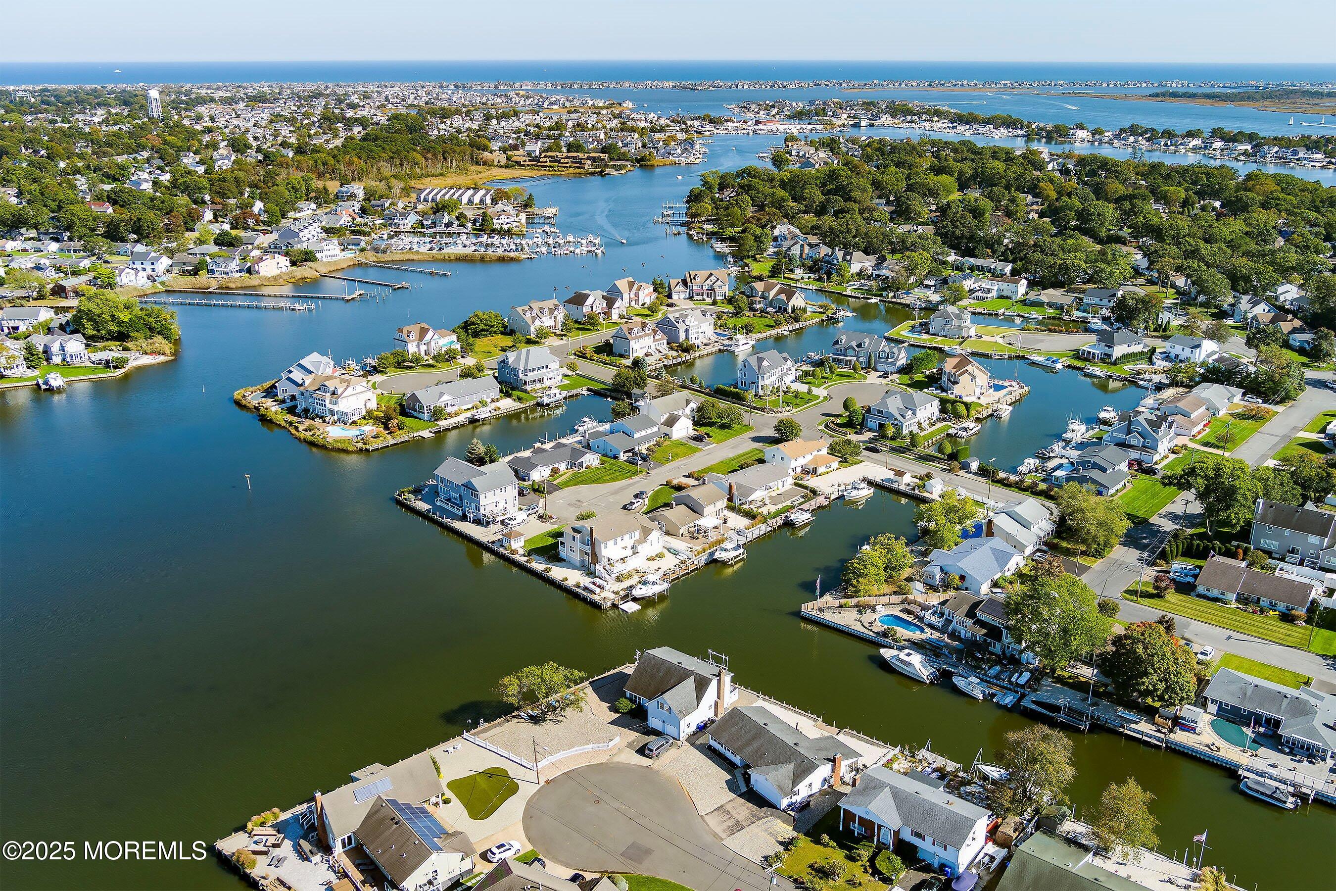 173 Cliff Road Brick, NJ 08724 - Photo 27 of 37 an aerial view of a house with a lake view