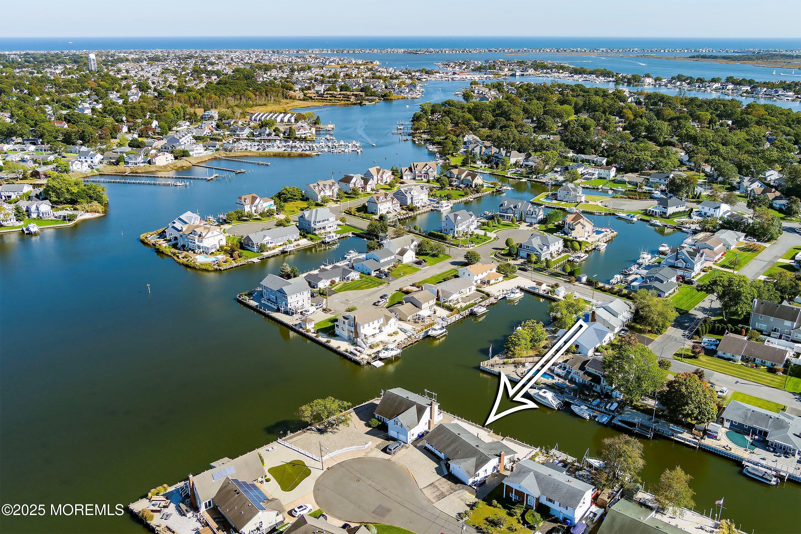 173 Cliff Road Brick, NJ 08724 - Photo 28 of 37 an aerial view of a house with a lake view