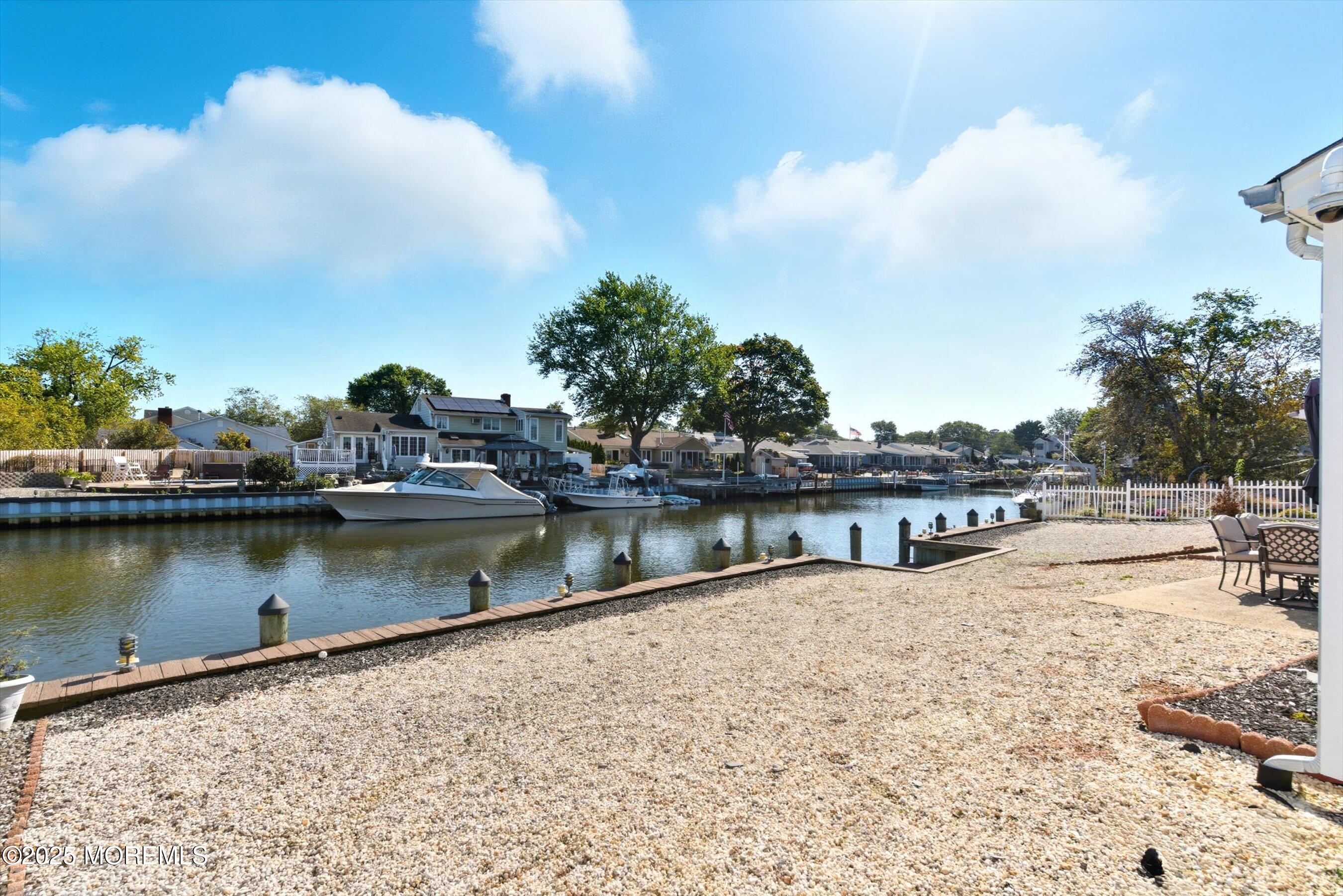 173 Cliff Road Brick, NJ 08724 - Photo 31 of 37 a view of a lake with houses