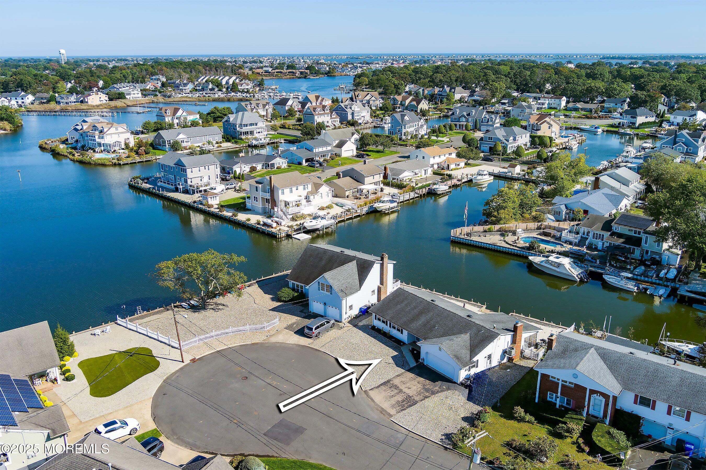 173 Cliff Road Brick, NJ 08724 - Photo 36 of 37 an aerial view of a house with a lake view