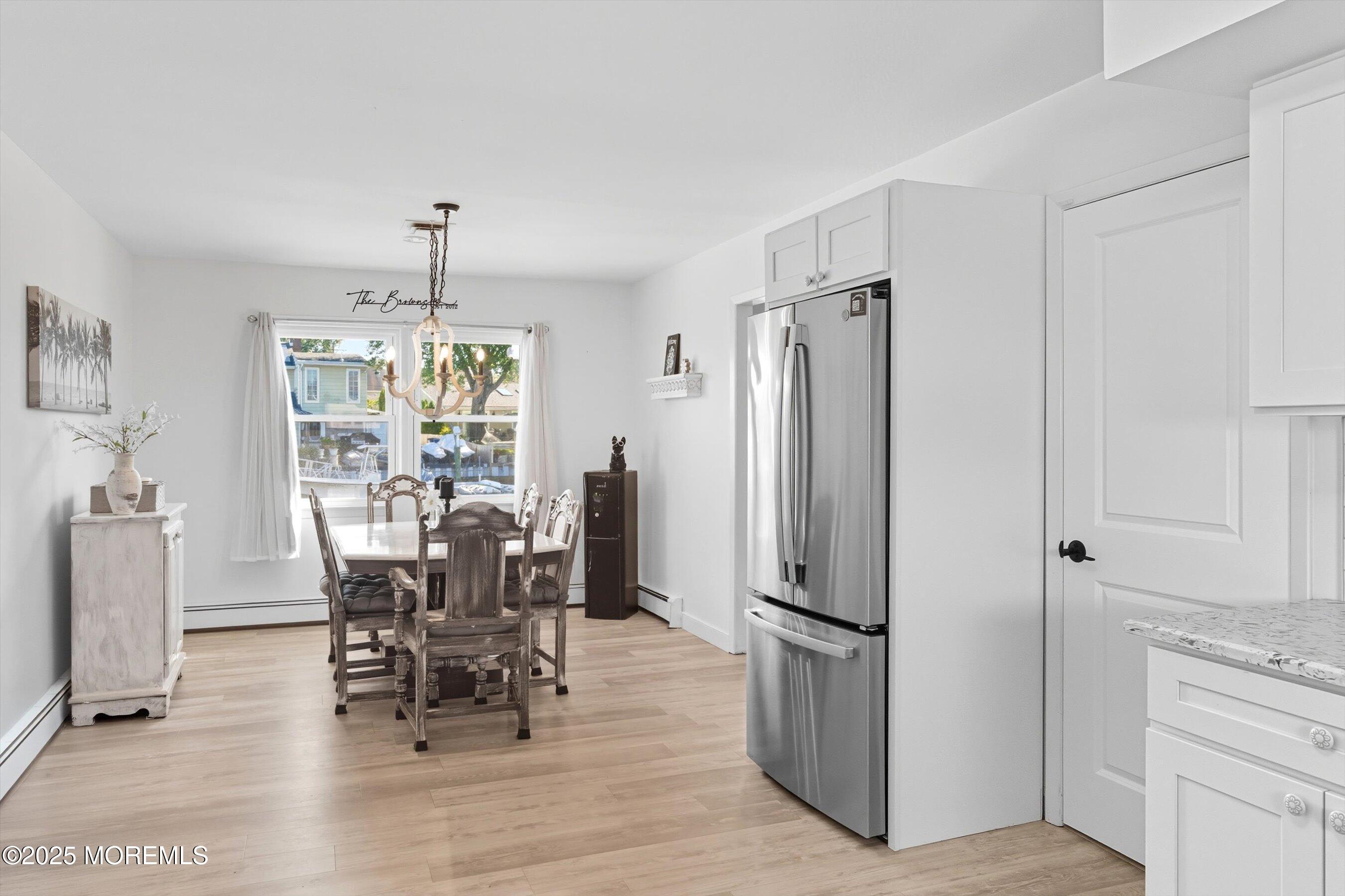 173 Cliff Road Brick, NJ 08724 - Photo 6 of 37 a view of a dining room with furniture window and outside view