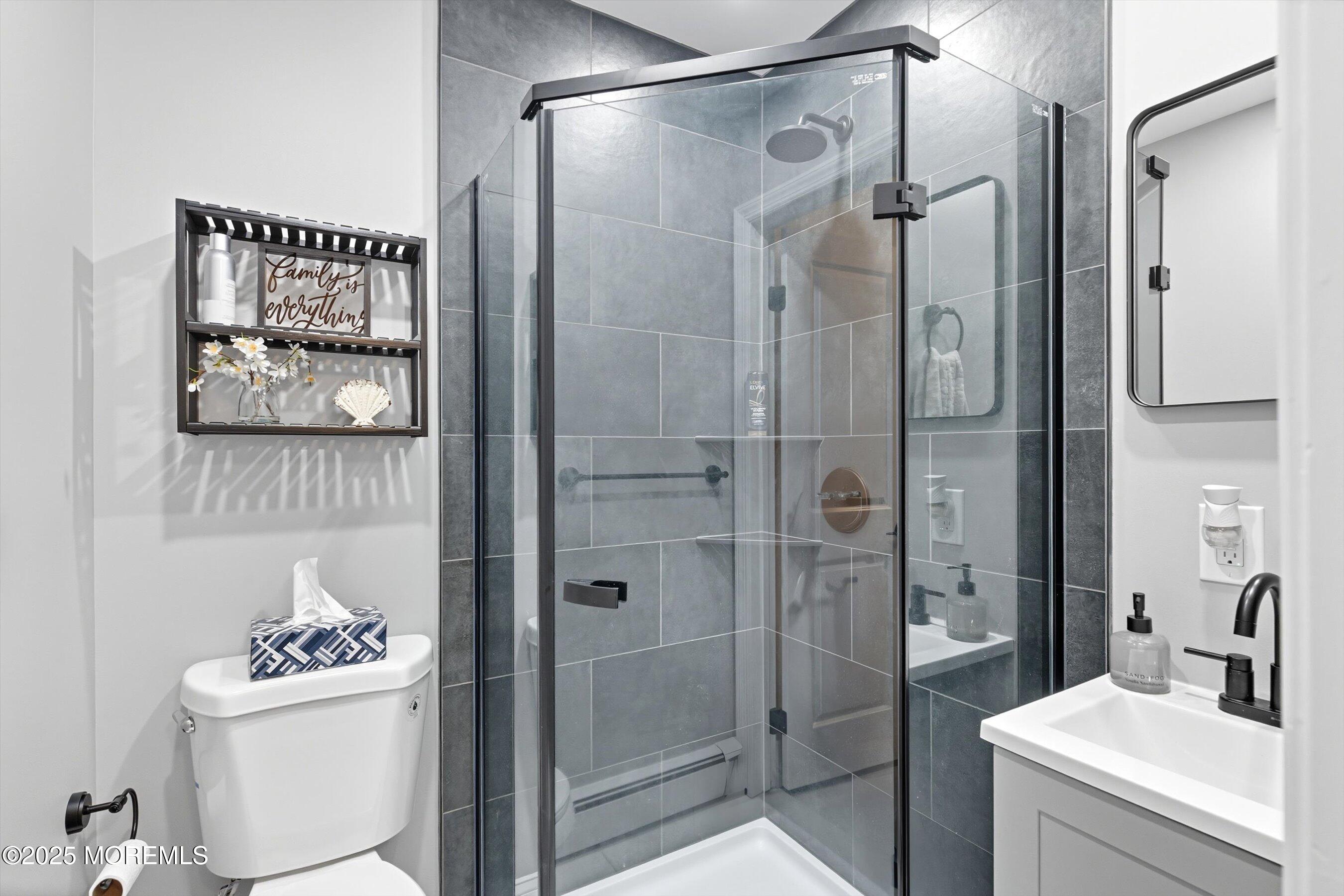 173 Cliff Road Brick, NJ 08724 - Photo 9 of 37 a bathroom with a sink toilet and shower