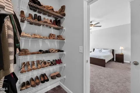 a kitchen with a stove and a refrigerator