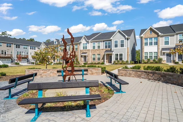 a view of a swimming pool with sitting area