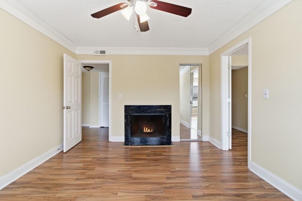 6851 Roswell Road, Unit B15 Sandy Springs, GA 30328 - Photo 16 of 30 a view of a livingroom with a fireplace and window