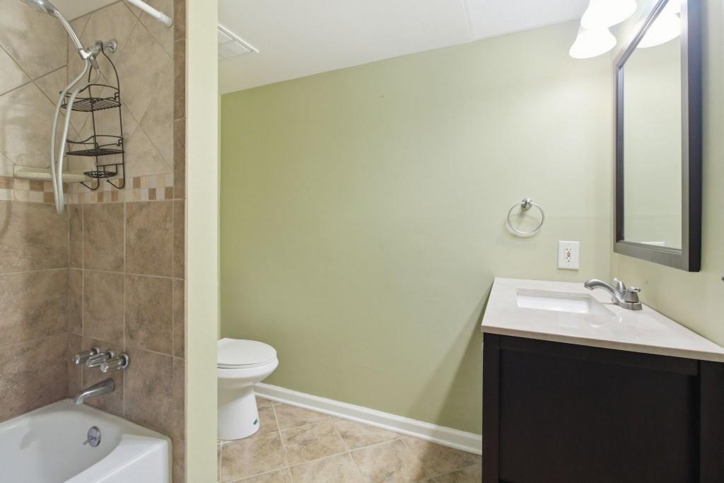 6851 Roswell Road, Unit B15 Sandy Springs, GA 30328 - Photo 17 of 30 a bathroom with a sink and toilet