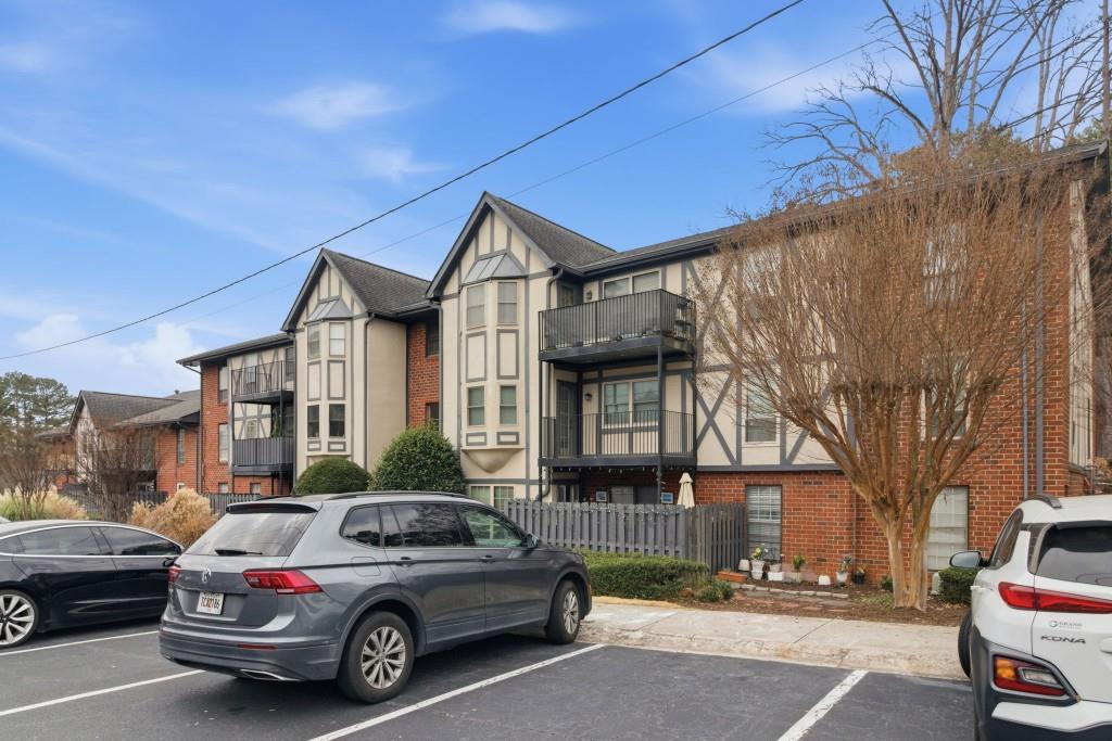 6851 Roswell Road, Unit B15 Sandy Springs, GA 30328 - Photo 30 of 30 a car parked in front of a house