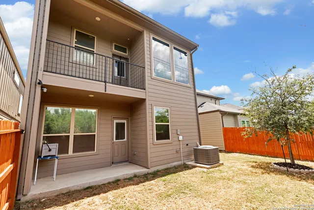 a house view with a outdoor space