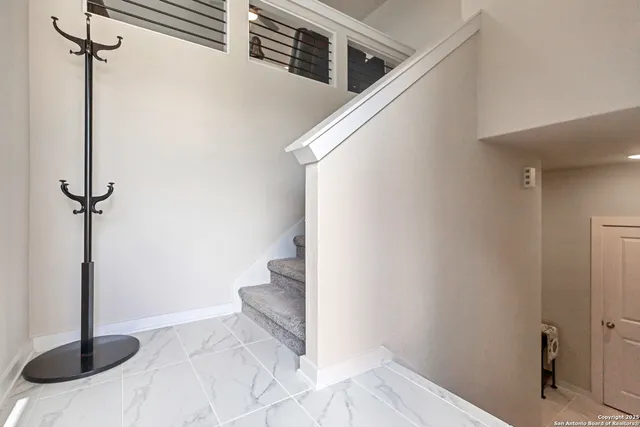 a view of a hallway with toilet