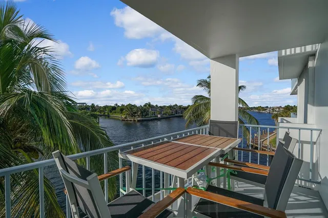 a view of balcony with furniture