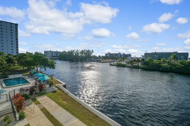 a view of a lake with a city view
