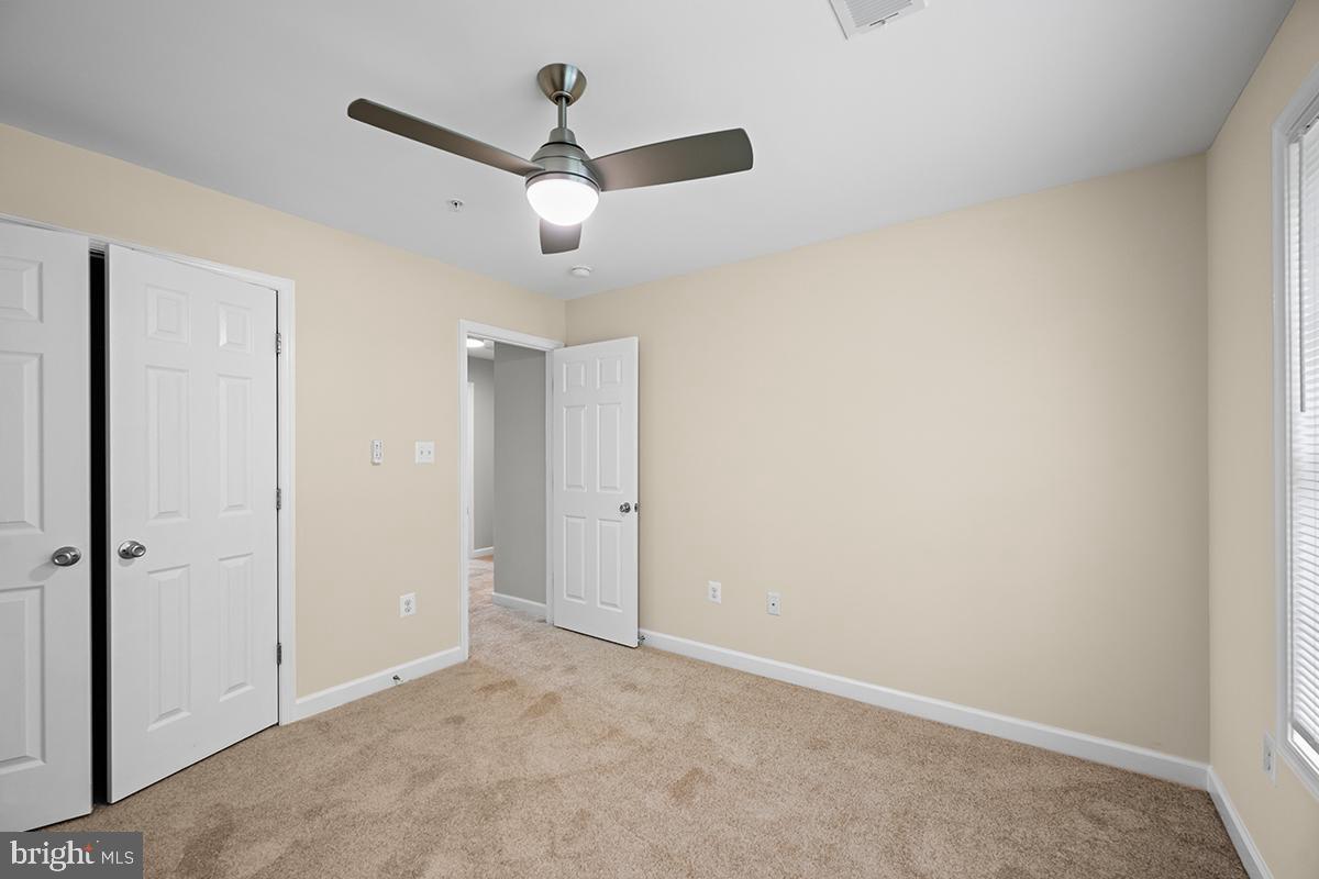 6712 Ridgecrest Road New Market, MD 21774 - Photo 44 of 69 an empty room with ceiling fan