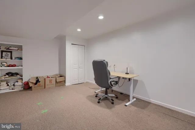 a view of a workspace with furniture