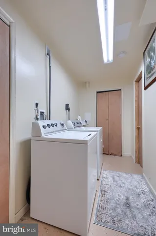 a bathroom with a sink a mirror and a vanity