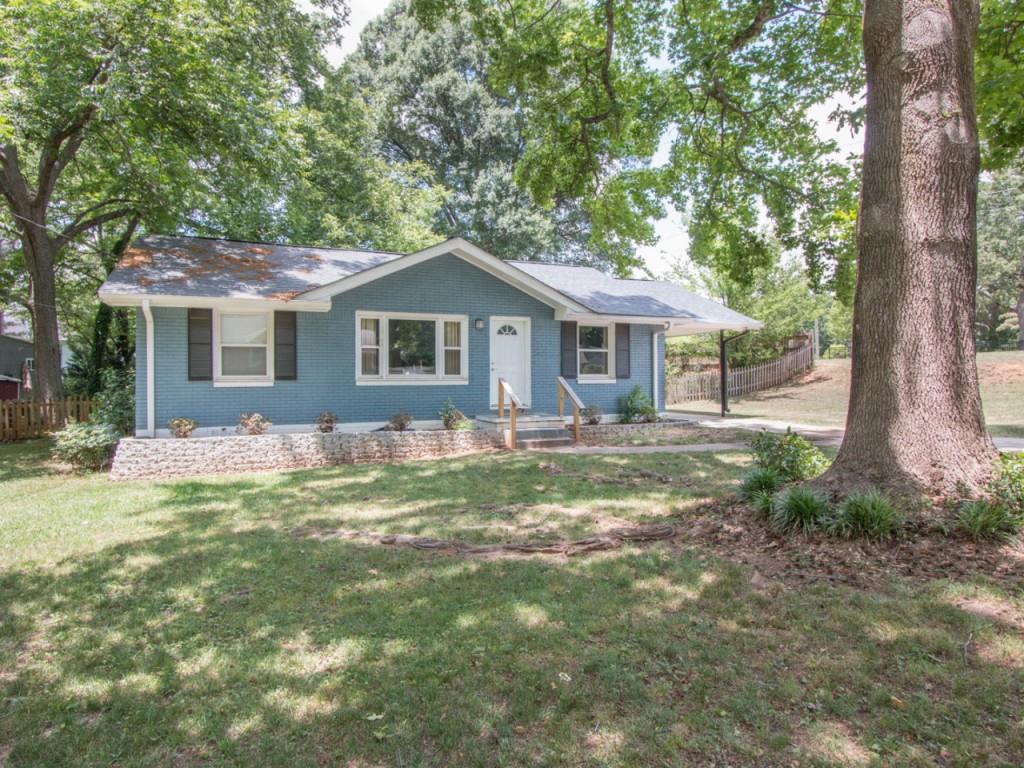 2910 Monticello Place Decatur, GA 30030 - Photo 1 of 1 a front view of a house with a garden