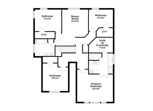 a view of an empty room and kitchen view