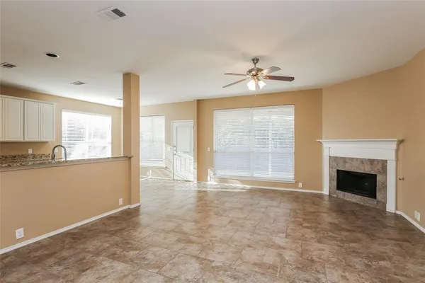 a kitchen with a refrigerator and a sink
