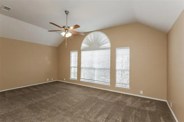 a view of a room with a fan