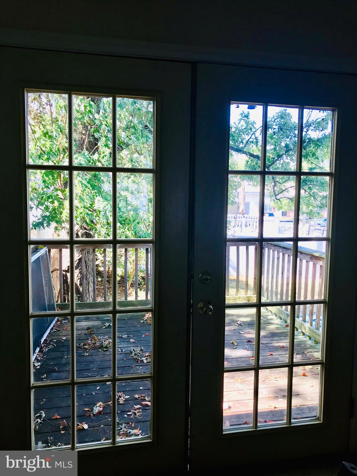 7732 Notley Road Pasadena, MD 21122 - Photo 9 of 51 French doors to upper-level deck