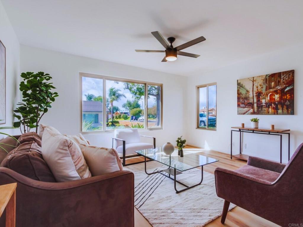 1025 Plover Way Oceanside, CA 92057 - Photo 5 of 36 a living room with furniture and a window