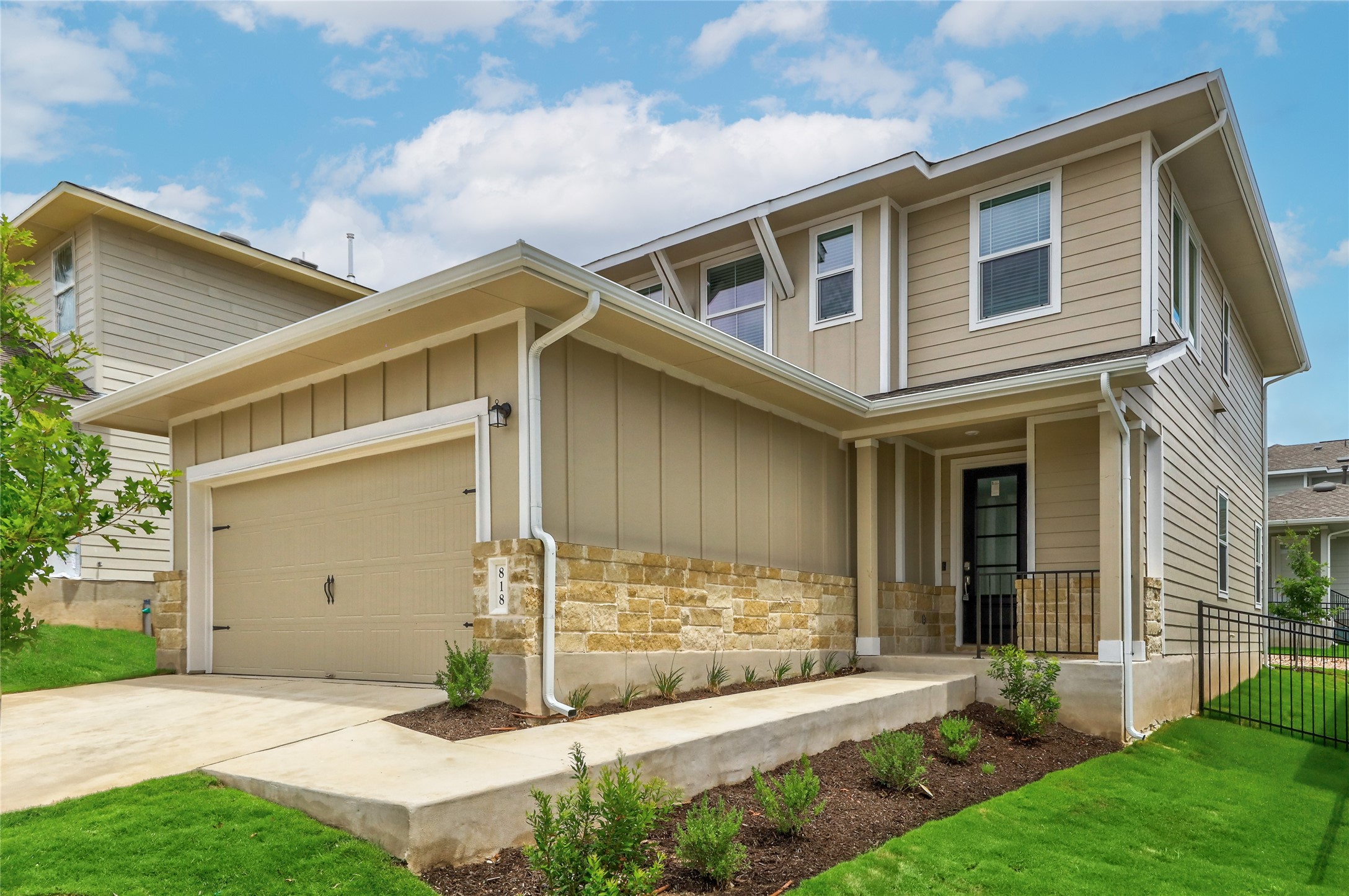818 Affazia Lane Georgetown, TX 78628 - Photo 1 of 27 a front view of a house with a yard and garage