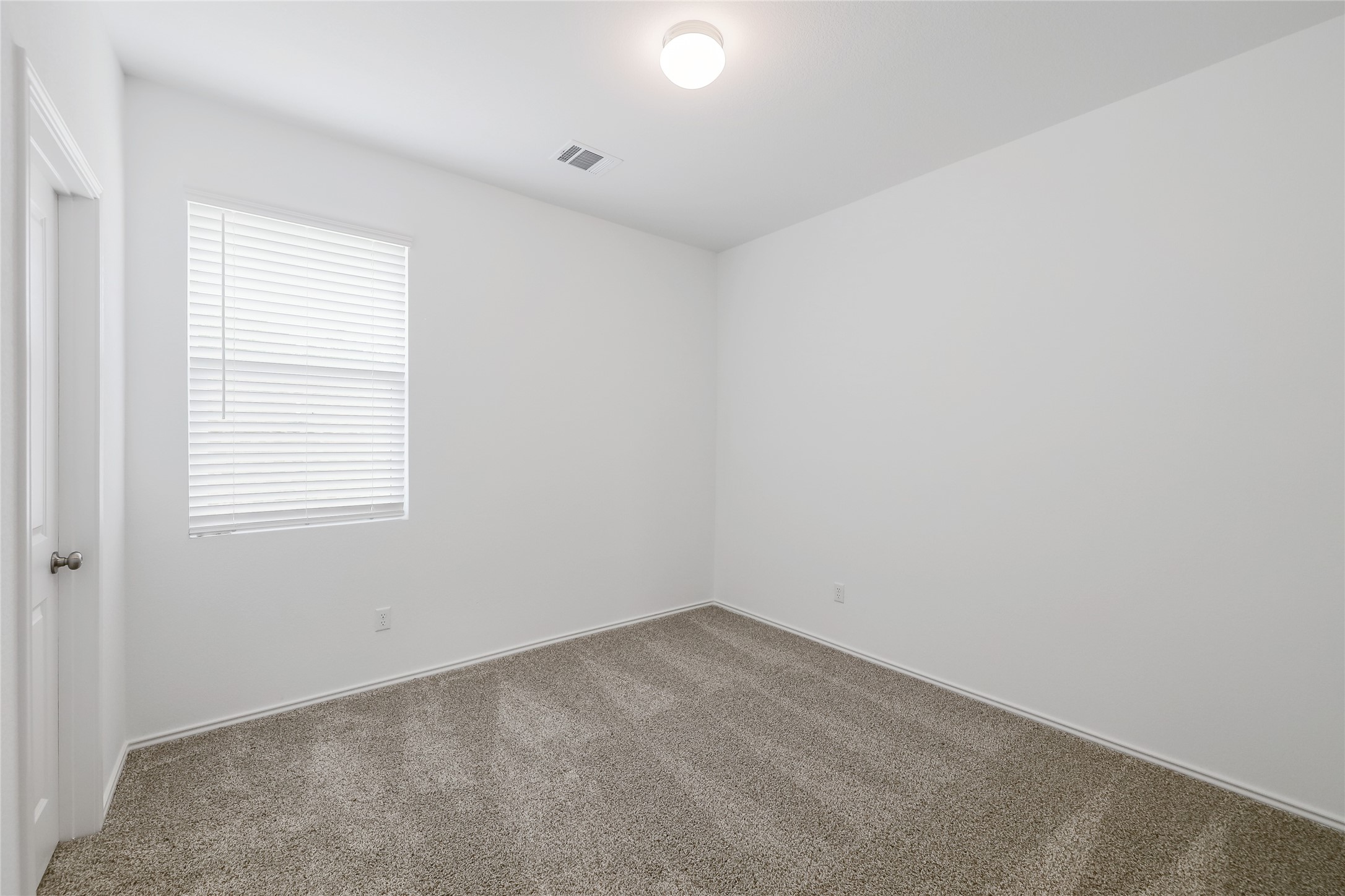 818 Affazia Lane Georgetown, TX 78628 - Photo 19 of 27 an empty room with a window